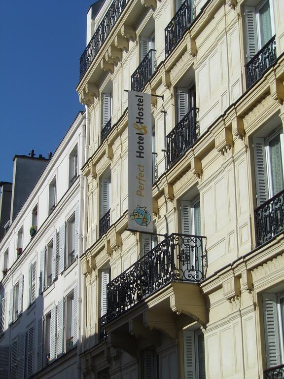 Perfect Hotel&Hostel Parijs Buitenkant foto The photo shows a building with a light-colored facade and decorative architectural features. There's a sign hanging from the building that reads "Perfect Hotel/Hostel." The sign is prominently displayed, indicating that this is an accommodation esta